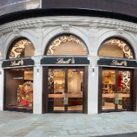 Lindt unwraps London flagship under Piccadilly Lights and acquires €87m headquarters in same landmark building